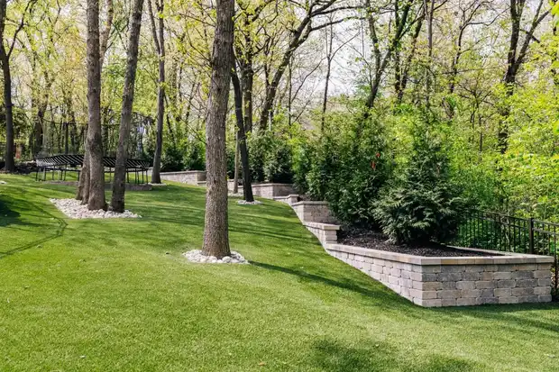 Kindred Outdoor Solutions landscaping and hardscape work on a Kansas City property