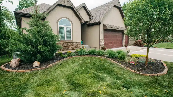 Front of a residential property with mature landscaping